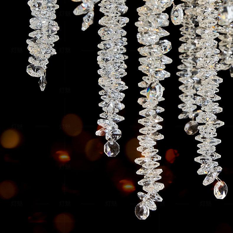 Elyuira lámpara de araña en oro con ramas y cascada de cristal elegante