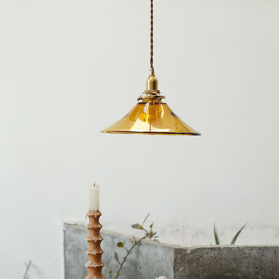 Pila lámpara colgante de vidrio ámbar y latón estilo vintage para comedor