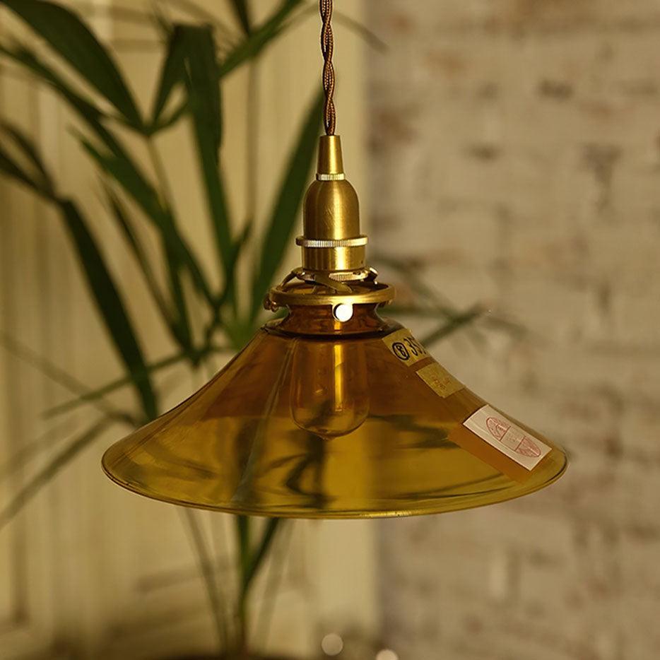 Pila lámpara colgante de vidrio ámbar y latón estilo vintage para comedor