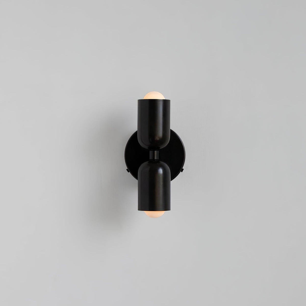 Teriisaine aplique de pared doble direccional