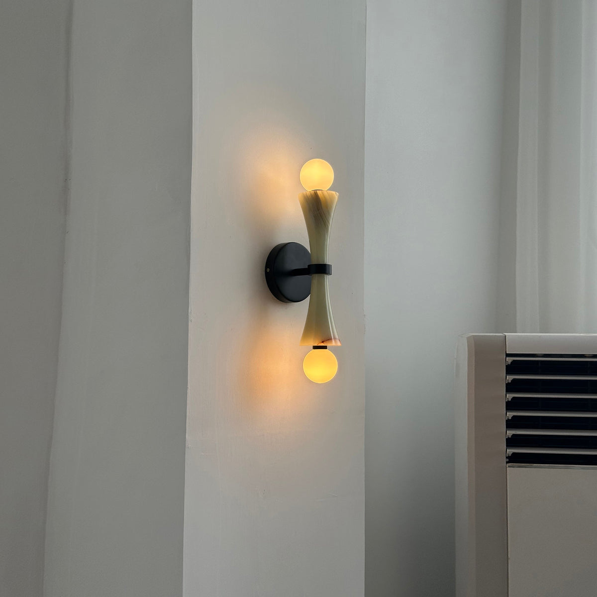 Elaiselle aplique de pared