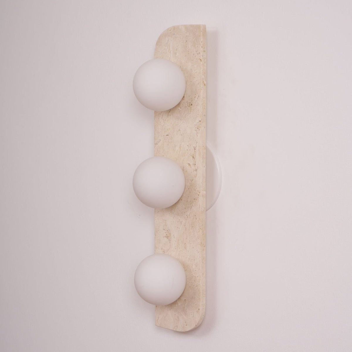 Taviniella aplique de pared minimalista en travertino