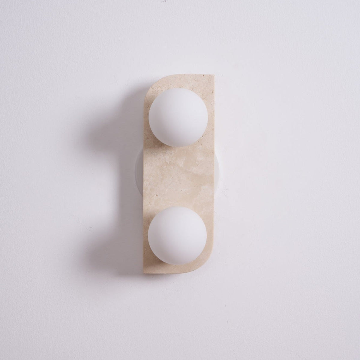 Taviniella aplique de pared minimalista en travertino