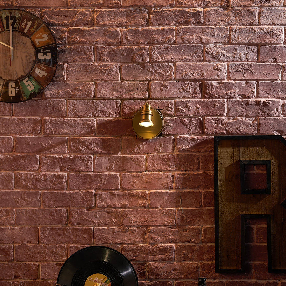 Corten aplique de pared en latón