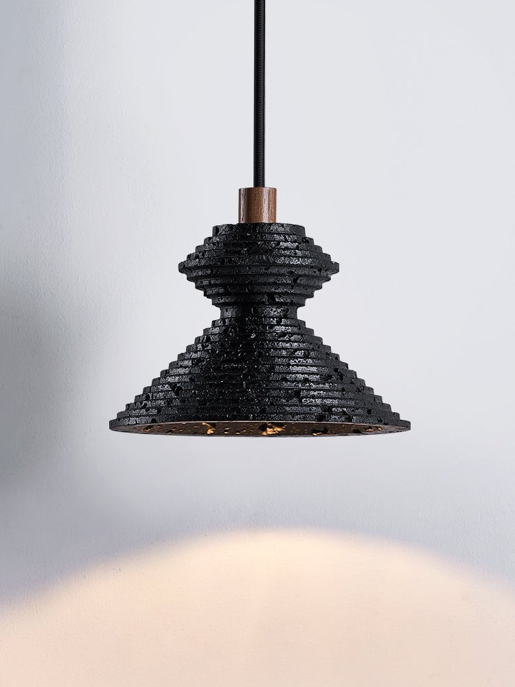 Elia lámpara colgante en travertino negro con textura estratificada