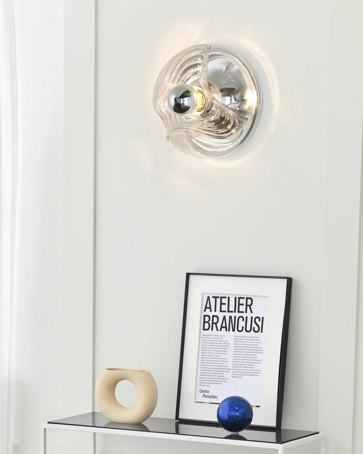Aplique de pared moderno con textura en espiral, color gris y transparente