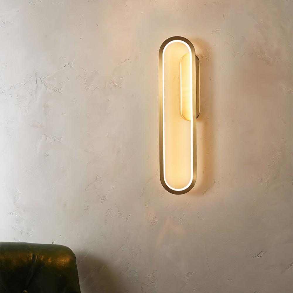 Dhu aplique de pared clásico largo Ova en latón