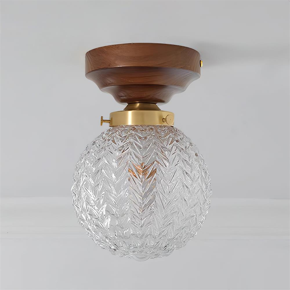 Lámpara de techo con cúpula de vidrio transparente y casquillo de latón, en madera de nogal esfera