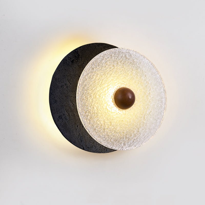 Valalaine aplique de pared con disco de vidrio texturizado y placa trasera de travertino negro