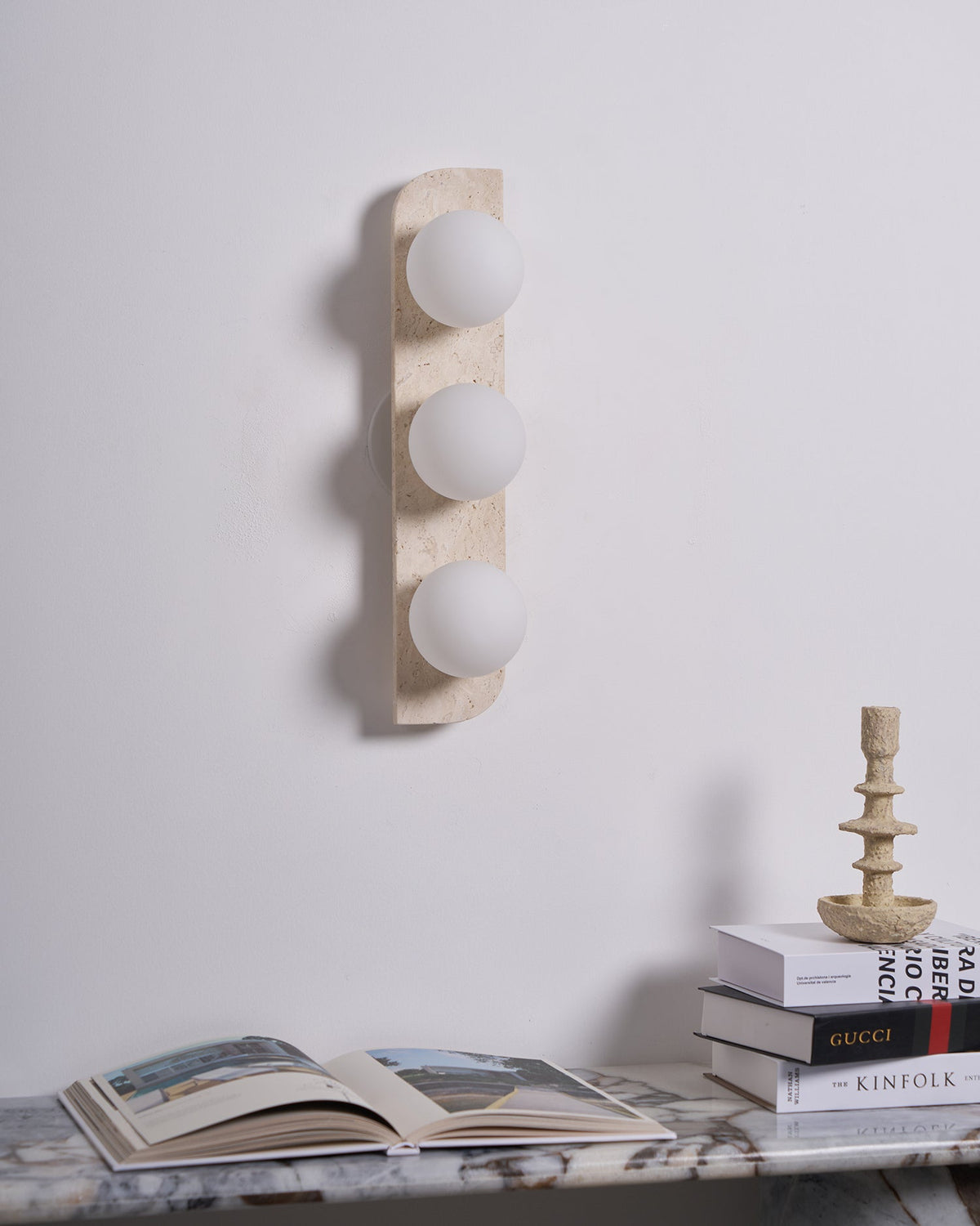 Taviniella aplique de pared minimalista en travertino
