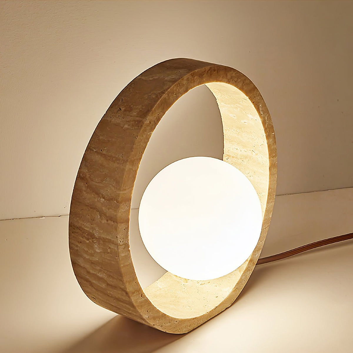 Orzore lámpara de mesa circular de travertino