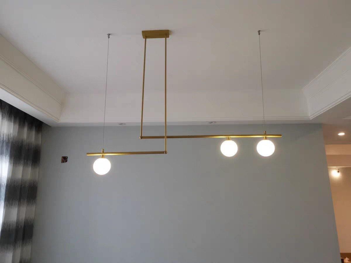 Estix lámpara colgante latón lineal satélite minimalista