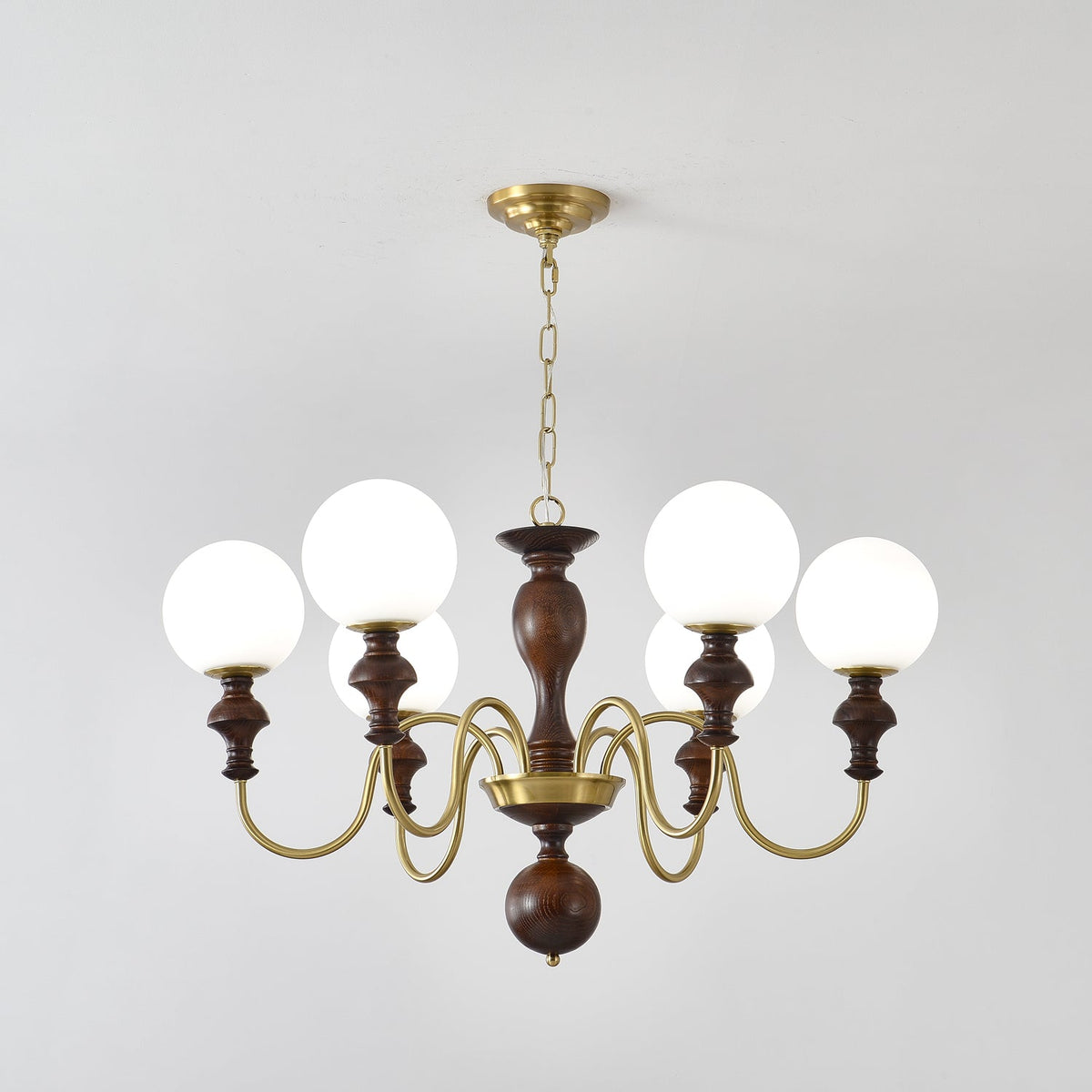 Indris lámpara de araña de madera y latón con esfera atemporal