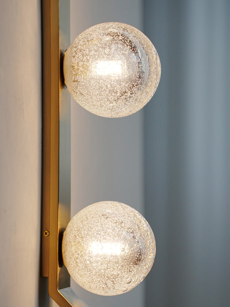 Teriivelle aplique de pared vertical con tres globos texturizado