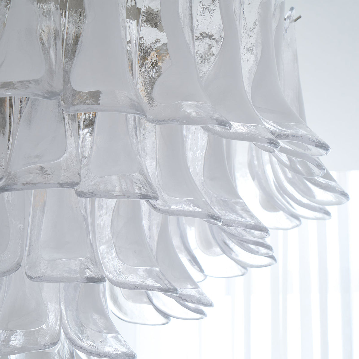 Celenira lámpara de techo con vidrio transparente y capas onduladas elegantes