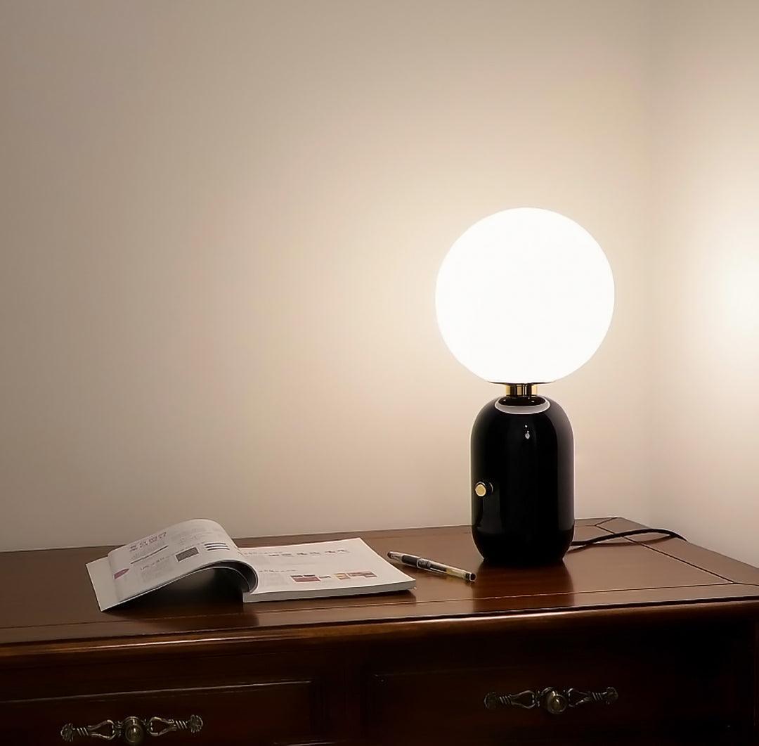 Nyxen lámpara de mesa industrial de vidrio