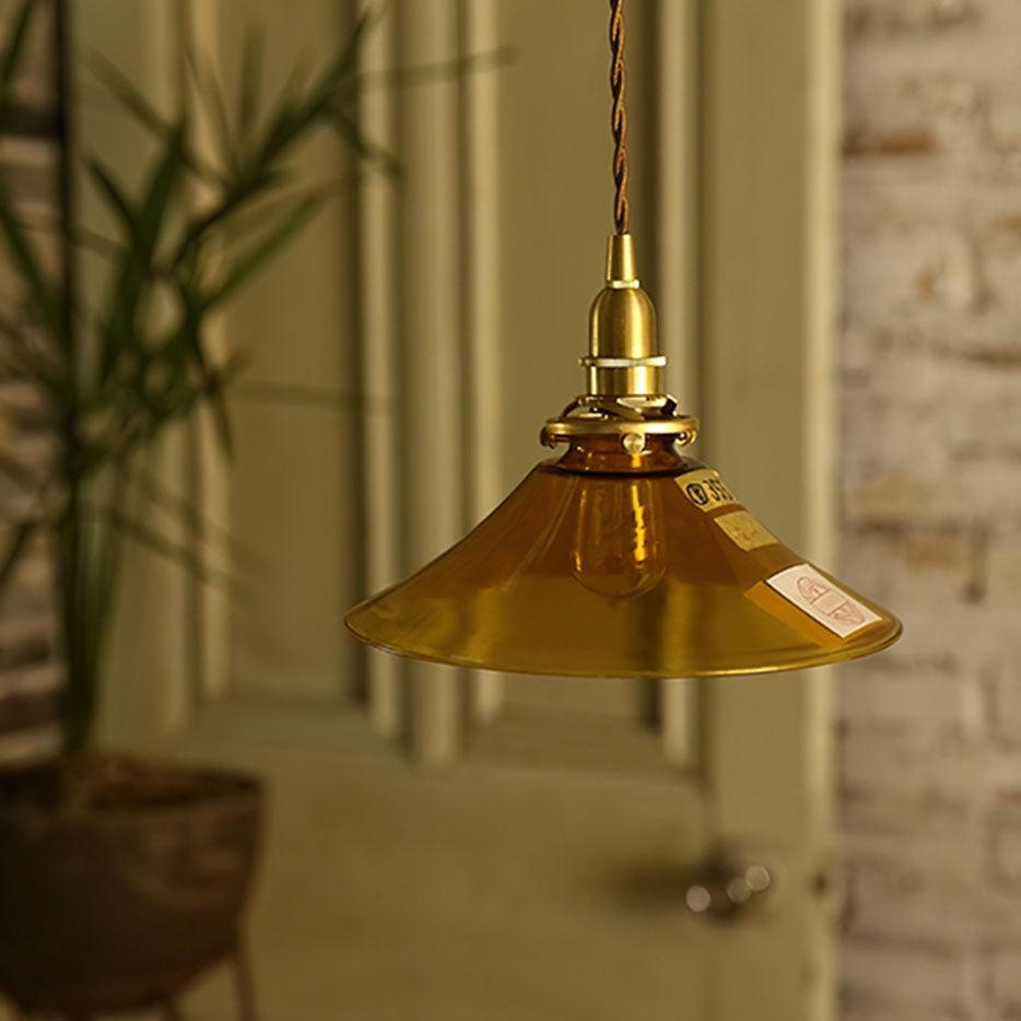 Pila lámpara colgante de vidrio ámbar y latón estilo vintage para comedor