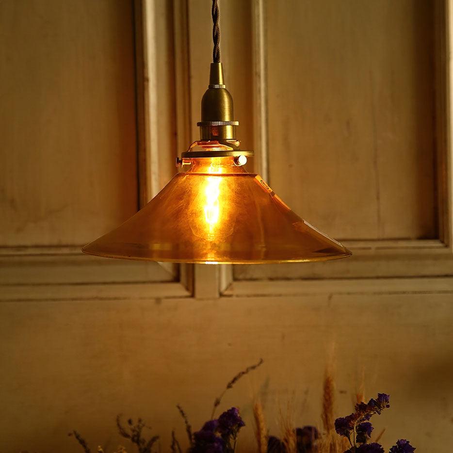 Pila lámpara colgante de vidrio ámbar y latón estilo vintage para comedor