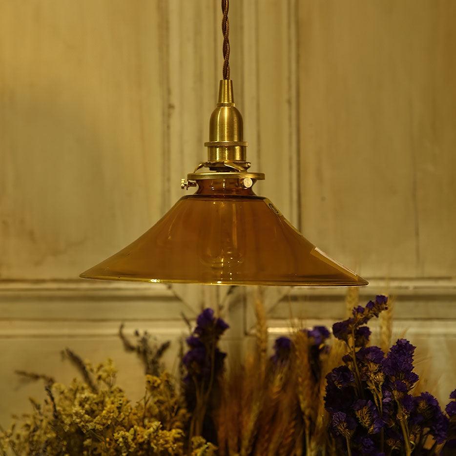 Pila lámpara colgante de vidrio ámbar y latón estilo vintage para comedor