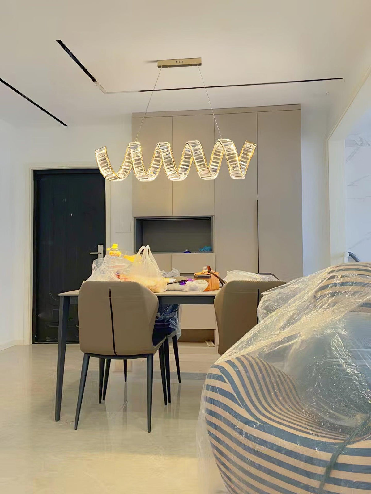 Luxielle lámpara de araña LED curva con cristal lujoso