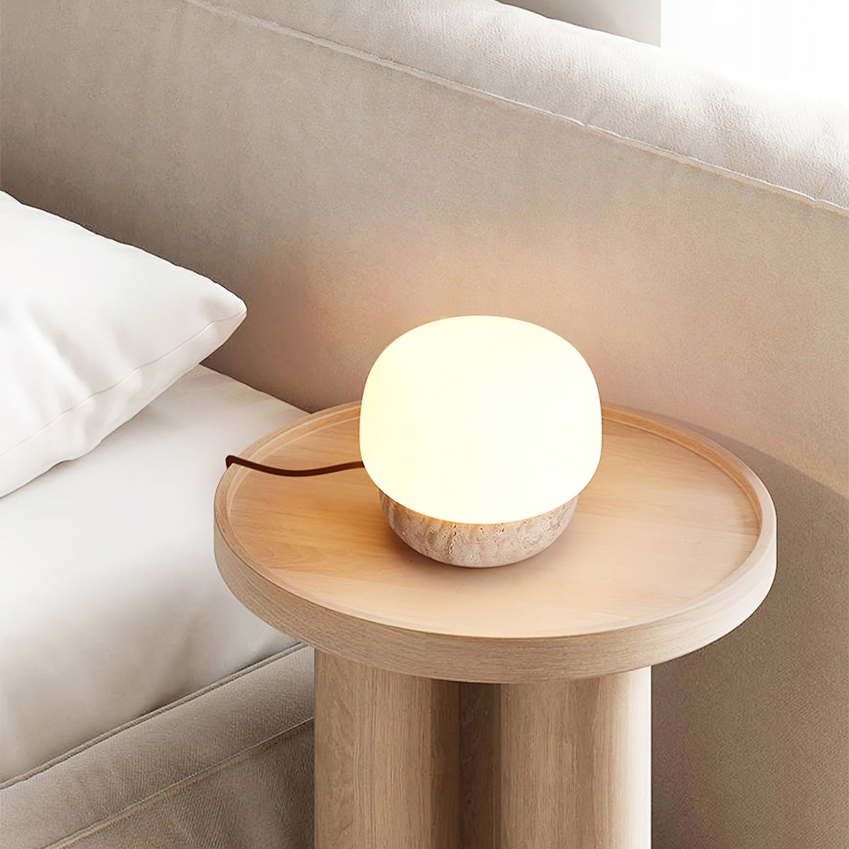 Eldoreth lámpara de mesa con base cúpula de travertino