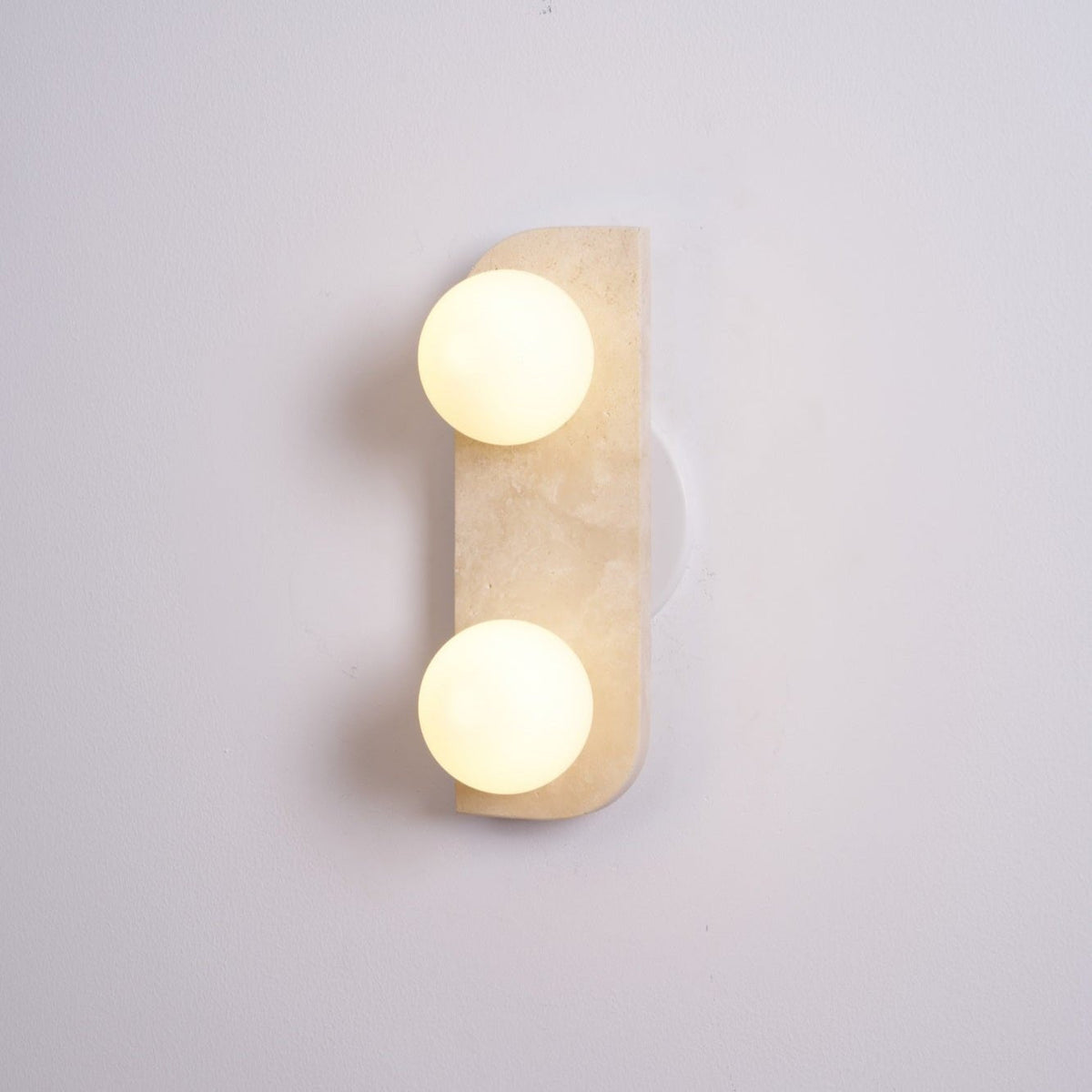 Taviniella aplique de pared minimalista en travertino