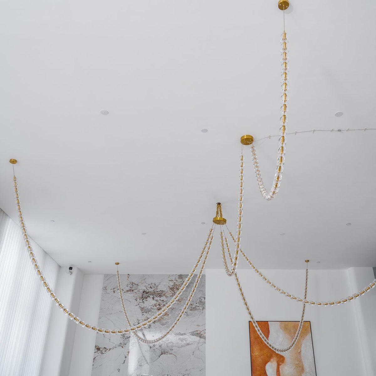 Elyisaine lámpara de araña cristal dorado LED 3-Line