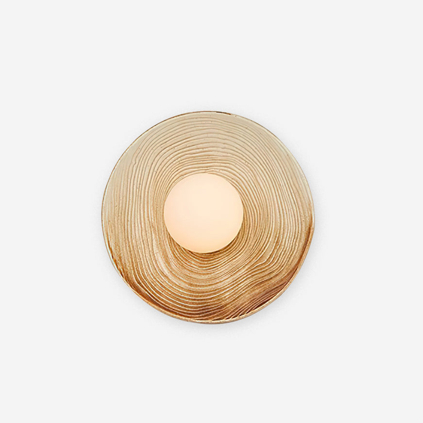 Aplique de pared moderno con disco de cerámica texturizada y acentos de madera