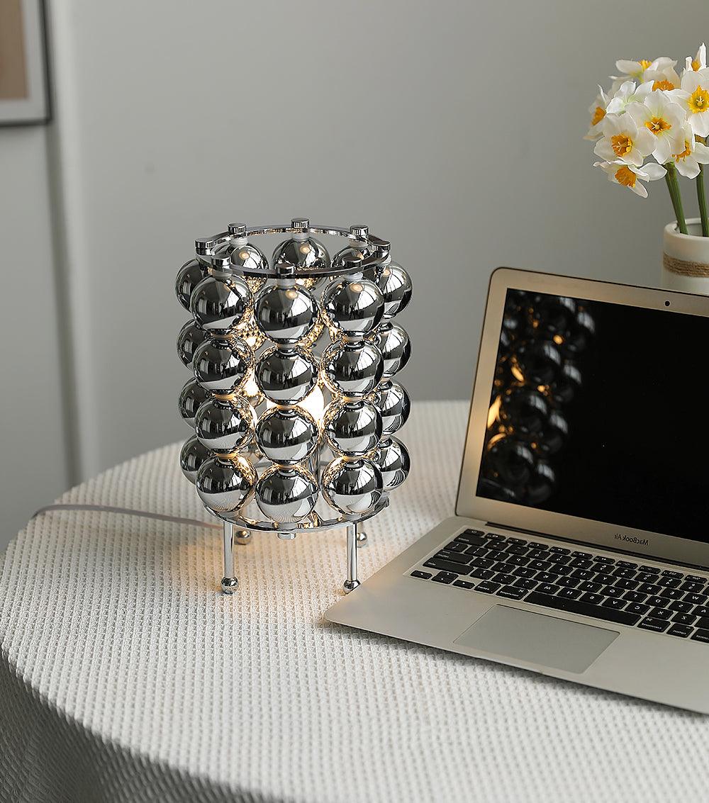 Lirra lámpara de mesa de acero futurista