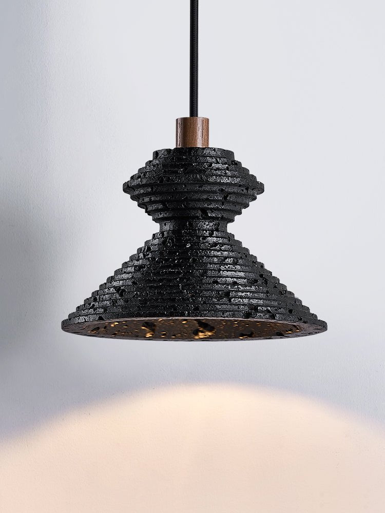 Elia lámpara colgante en travertino negro con textura estratificada