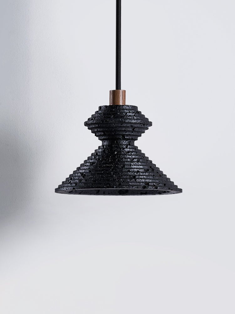 Elia lámpara colgante en travertino negro con textura estratificada