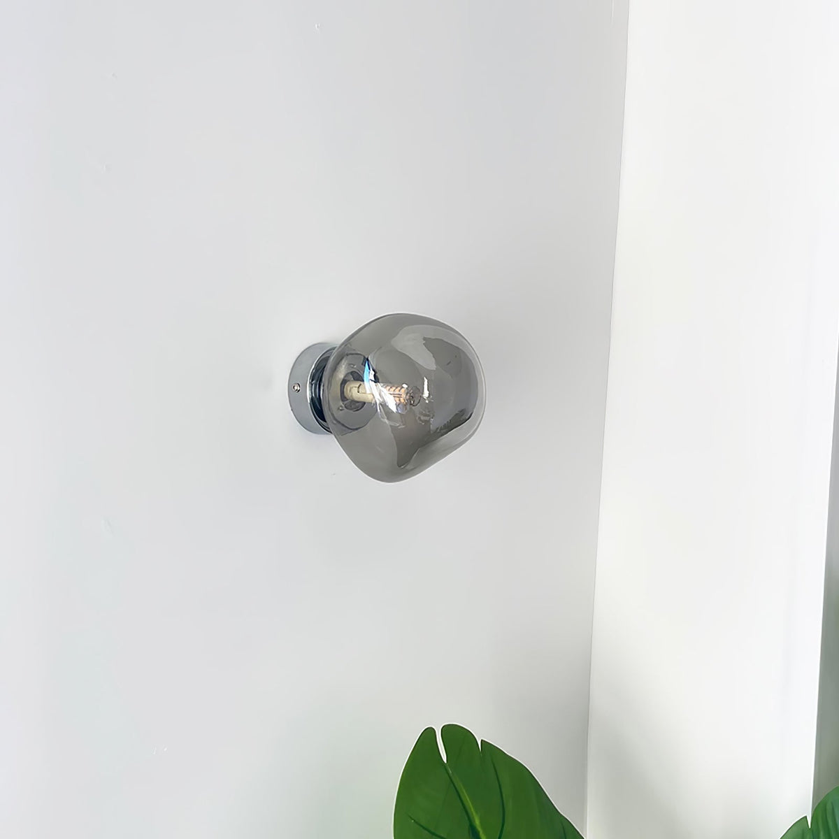 Leni aplique de pared con vidrio ámbar