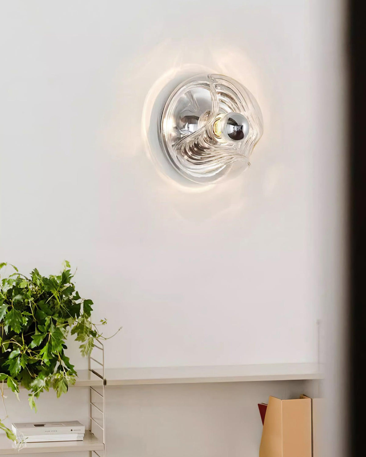 Aplique de pared moderno con textura en espiral, color gris y transparente