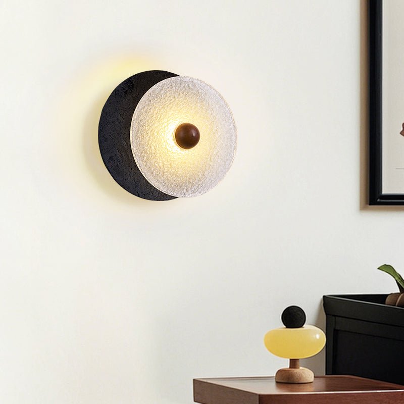 Valalaine aplique de pared con disco de vidrio texturizado y placa trasera de travertino negro