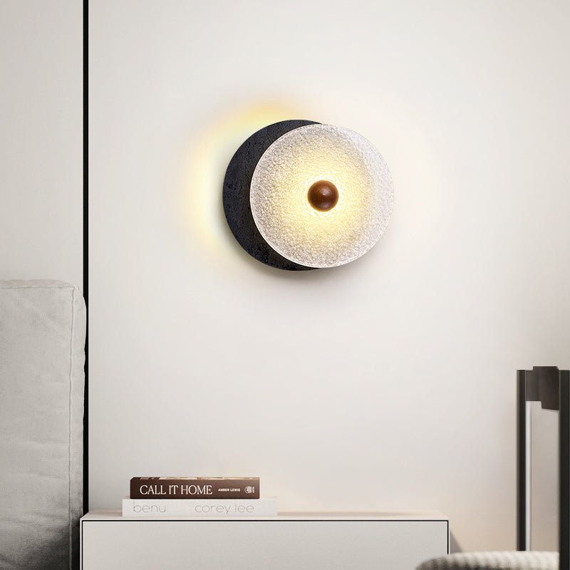 Valalaine aplique de pared con disco de vidrio texturizado y placa trasera de travertino negro