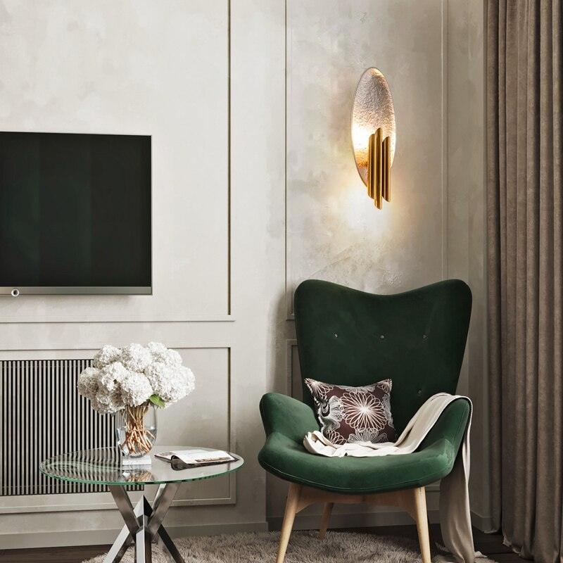 Aurerielle aplique de pared dorado negro minimalista