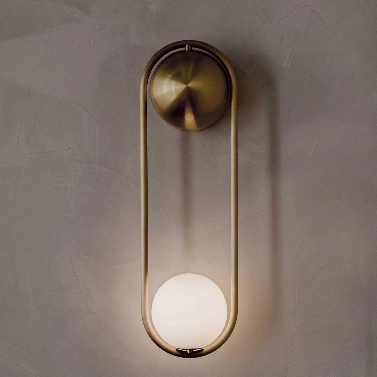 Solarine Radiain aplique de pared minimalista en latón