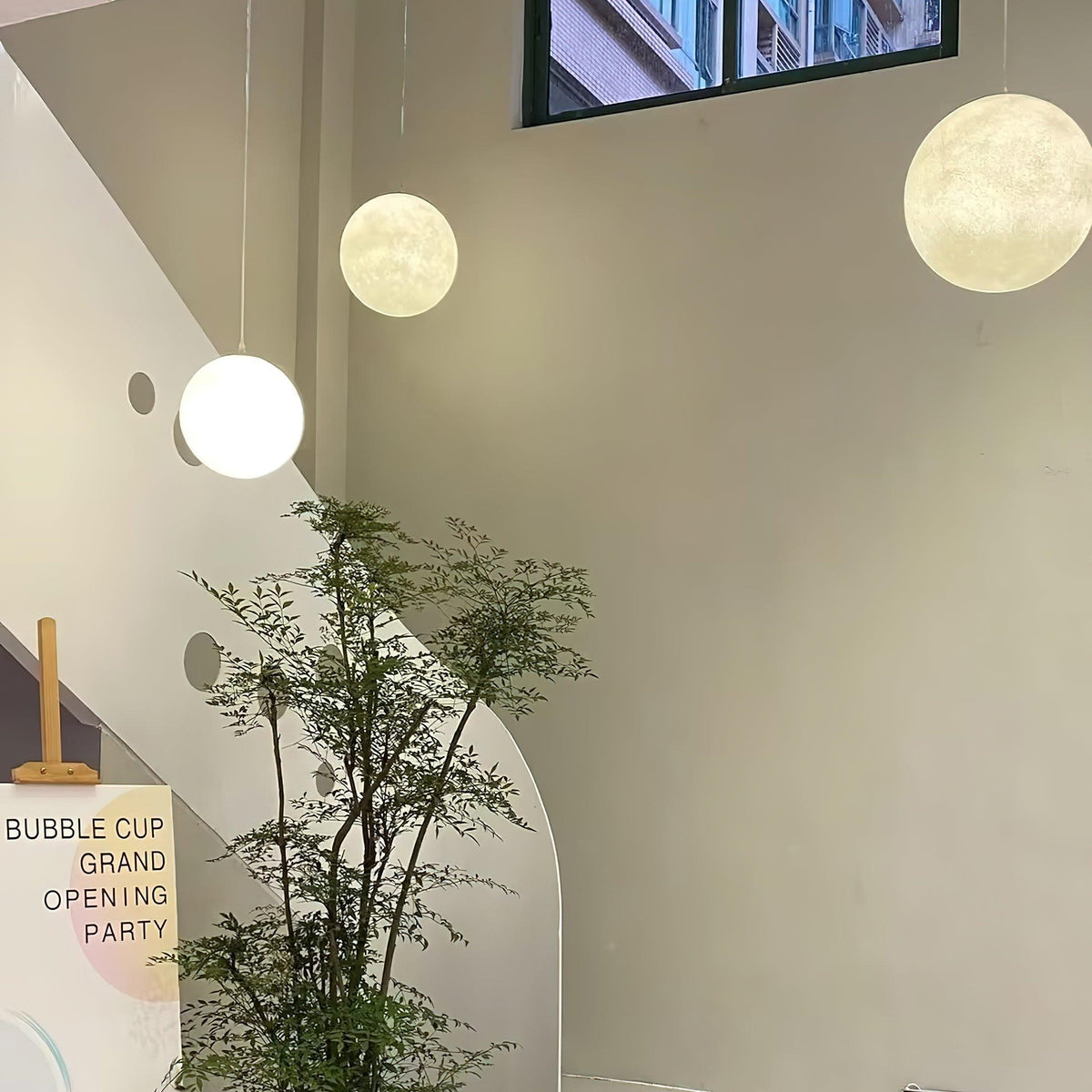 Miralaine lámpara colgante en forma de luna para salón