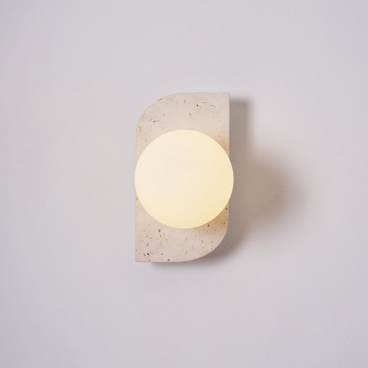 Taviniella aplique de pared minimalista en travertino