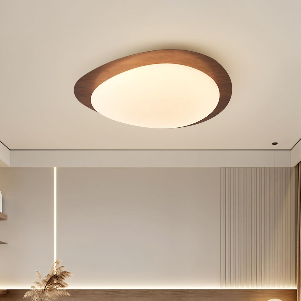 Sylenia lámpara de techo Pebble en nogal con acabado de grano de madera y pantalla de acrílico LED