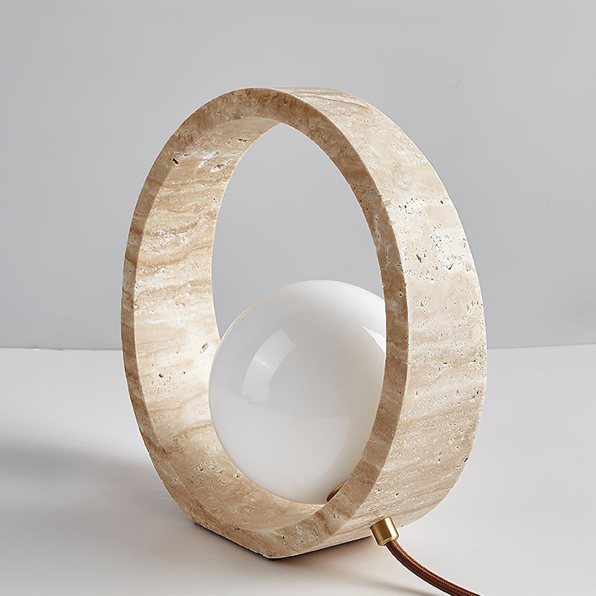 Orzore lámpara de mesa circular de travertino
