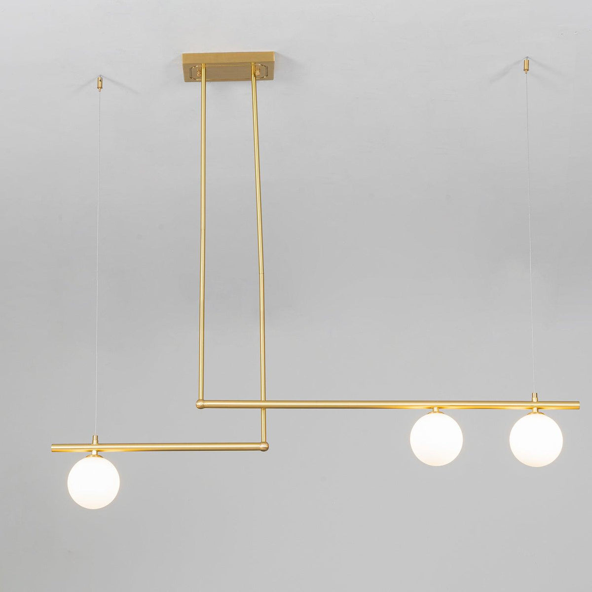 Estix lámpara colgante latón lineal satélite minimalista