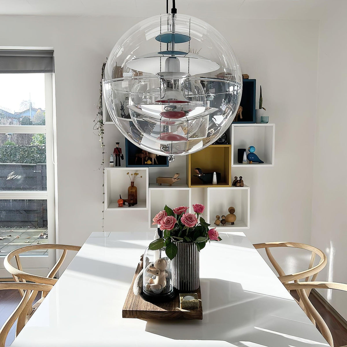 Lámpara colgante moderna de esfera transparente con capas geométricas flotantes