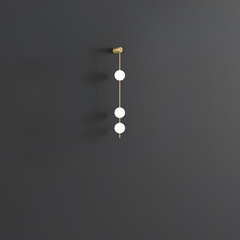 Soloiella aplique de pared Vertical Balls latón