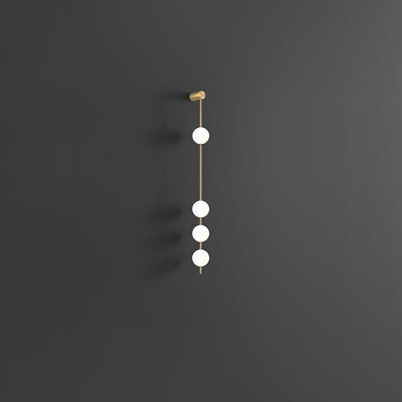 Soloiella aplique de pared Vertical Balls latón
